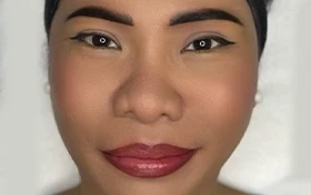 The same face after brows, lash line and lip blush by Kate Kanner